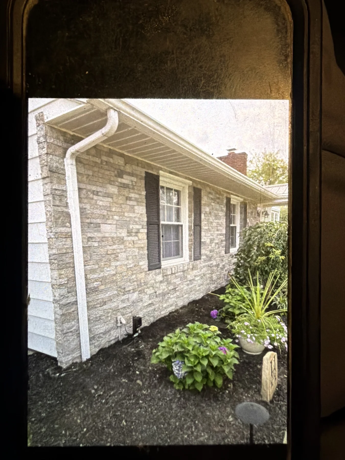 Stone veneer installed across the exterior of a residential home
